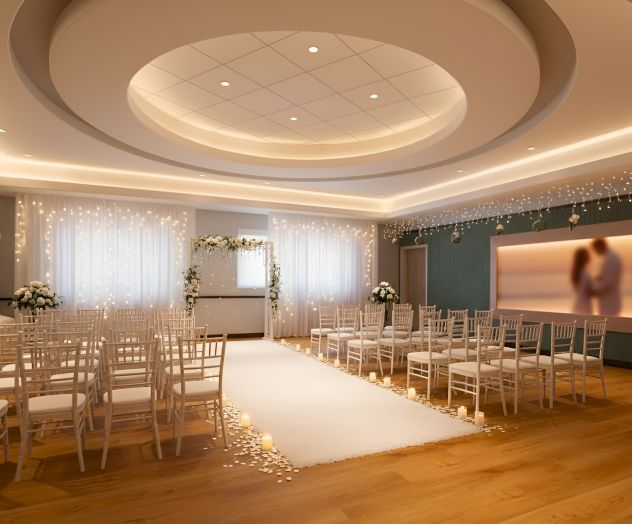 This image shows a beautifully decorated wedding ceremony room with arranged chairs, floral arch, and soft lighting.